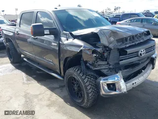 2014 Toyota Tundra 2WD Truck SR5 with VIN 5TFEY5F19EX164499, listed as a IAAI auction lot 41528439 with NaN miles. Bid and sale history available at carsss.com. Image 1.