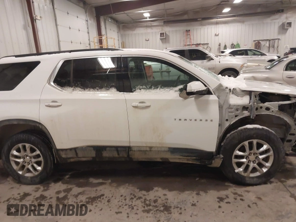 2020 Chevrolet Traverse LT Cloth z VIN 1GNERGKWXLJ263981, wystawiony jako IAAI lot #41606187 z przebiegiem 65 134 mil mil oraz . Historia ofert i sprzedaży dostępna na DreamBid. Obrazek 13.