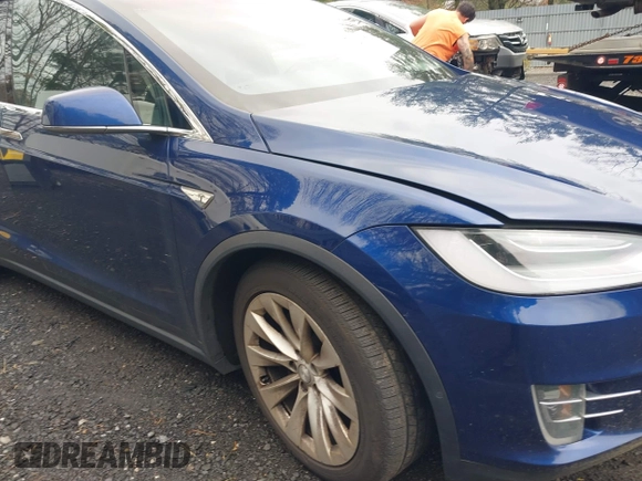 2016 Tesla Model X 70D with VIN 5YJXCBE20GF016173, listed as a IAAI auction lot 41809725 with 116,198 mi miles. Bid and sale history available at carsss.com. Image 6.