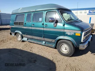 1995 Chevrolet Chevy Van z VIN 1GBEG25K3SF249372, wystawiony jako Copart lot #72284224 z przebiegiem 72 331 mil mil oraz Tytuł czysty. Historia ofert i sprzedaży dostępna na DreamBid. Obrazek 4.