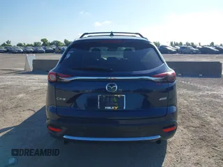 2016 Mazda CX-9 Grand Touring with VIN JM3TCADY6G0107064, listed as a IAAI auction lot 42580485 with 124,713 mi miles and . Bid and sale history available at DreamBid. Image 17.
