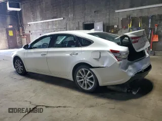 2015 Toyota Avalon Limited with VIN 4T1BK1EB6FU186515, listed as a Copart auction lot 54027865 with 104,000 mi miles and Salvage Title. Bid and sale history available at DreamBid. Image 2.