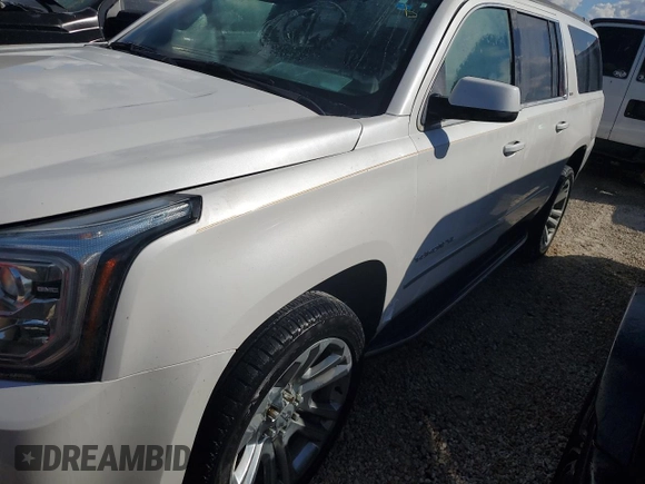 2020 GMC Yukon XL SLT with VIN 1GKS1GKC0LR160258, listed as a Copart auction lot 76796114 with 0 mi miles and Salvage Title. Bid and sale history available at carsss.com. Image 1.