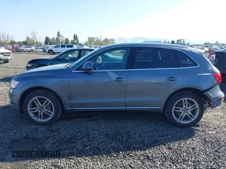 2014 Audi Q5 Premium Plus z VIN WA1LFAFP4EA046884, wystawiony jako IAAI lot #41966231 z przebiegiem 69 940 mil mil oraz . Historia ofert i sprzedaży dostępna na DreamBid. Obrazek 14.