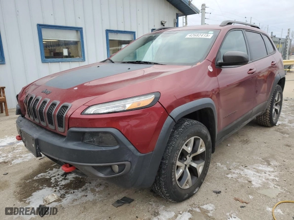 2015 Jeep Cherokee Trailhawk with VIN 1C4PJMBSXFW786638, listed as a Copart auction lot 42682415 with 139,229 mi miles and Salvage Title. Bid and sale history available at carsss.com. Image 1.