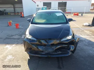 2019 Toyota Prius L Eco with VIN JTDKARFU9K3090948, listed as a IAAI auction lot 41400008 with 113,323 mi miles. Bid and sale history available at carsss.com. Image 12.