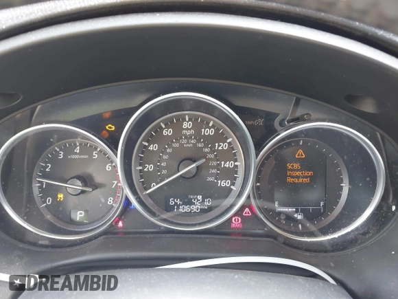 2014 Mazda CX-5 Touring z VIN JM3KE2CYXE0322943, wystawiony jako IAAI lot #41934670 z przebiegiem 110 690 mil mil oraz . Historia ofert i sprzedaży dostępna na DreamBid. Obrazek 7.