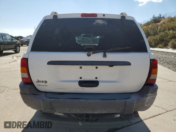 2003 Jeep Grand Cherokee Laredo with VIN 1J4GW48S83C517330, listed as a Copart auction lot 52765415 with 108,920 mi miles and Salvage title. Bid and sale history available at DreamBid. Image 6.