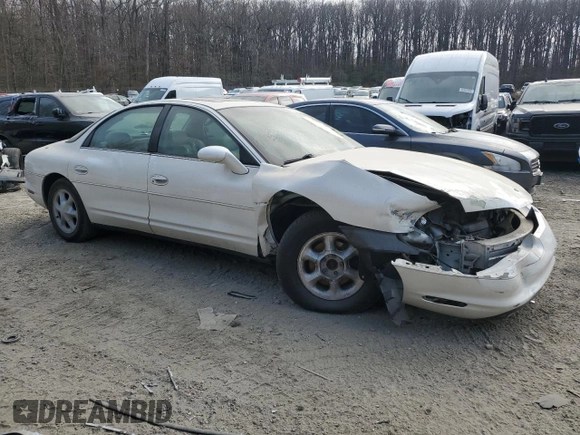 1999 Oldsmobile Aurora with VIN 1G3GR62C4X4112642, listed as a Copart auction lot 48176035 with 100,342 mi miles and Salvage Title. Bid and sale history available at DreamBid. Image 4.