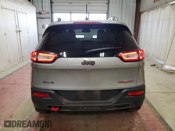 2017 Jeep Cherokee Trailhawk L Plus with VIN 1C4PJMBBXHW666051, listed as a Copart auction lot 51605455 with 99,259 mi miles and Salvage Title. Bid and sale history available at carsss.com. Image 6.