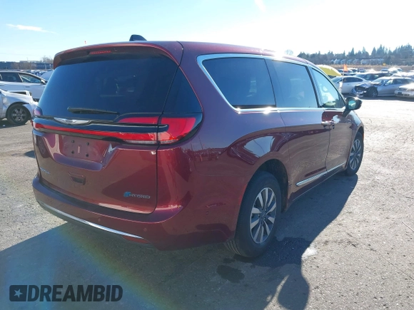 2023 Chrysler Pacifica Hybrid Limited with VIN 2C4RC1S7XPR518695, listed as a IAAI auction lot 41301401 with 24,433 mi miles and . Bid and sale history available at DreamBid. Image 4.
