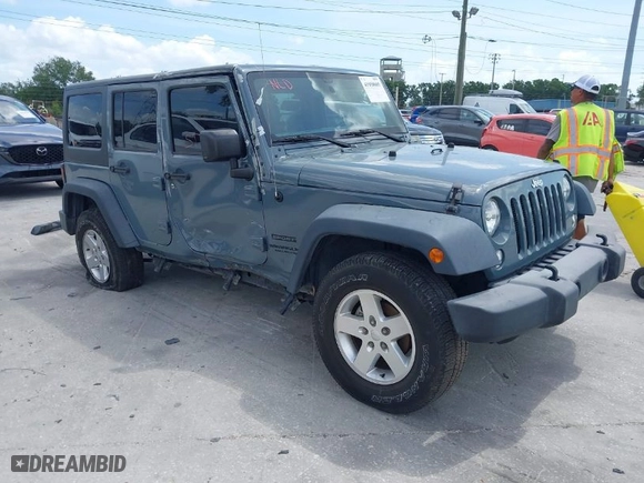 2015 Jeep Wrangler Unlimited Willys Wheeler with VIN 1C4BJWDG2FL730323, listed as a IAAI auction lot 41958605 with 75,192 mi miles. Bid and sale history available at carsss.com. Image 1.