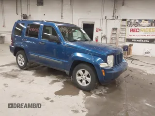 2009 Jeep Liberty Sport z VIN 1J8GN28K69W530476, wystawiony jako IAAI lot #41384502 z przebiegiem 220 869 mil mil oraz . Historia ofert i sprzedaży dostępna na DreamBid. Obrazek 1.