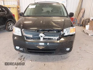2010 Dodge Grand Caravan Crew with VIN 2D4RN6DX1AR438135, listed as a IAAI auction lot 41734378 with 57,041 mi miles and . Bid and sale history available at DreamBid. Image 6.