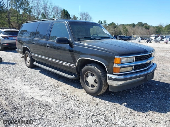 1999 Chevrolet Suburban with VIN 3GNEC16R0XG137834, listed as a IAAI auction lot 41853492 with 296,147 mi miles. Bid and sale history available at carsss.com. Image 1.