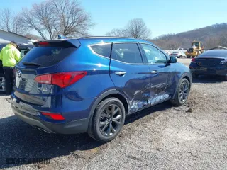 2017 Hyundai Santa Fe Sport 2.0T Ultimate with VIN 5XYZWDLA7HG466841, listed as a IAAI auction lot 41894336 with 106,261 mi miles. Bid and sale history available at carsss.com. Image 4.