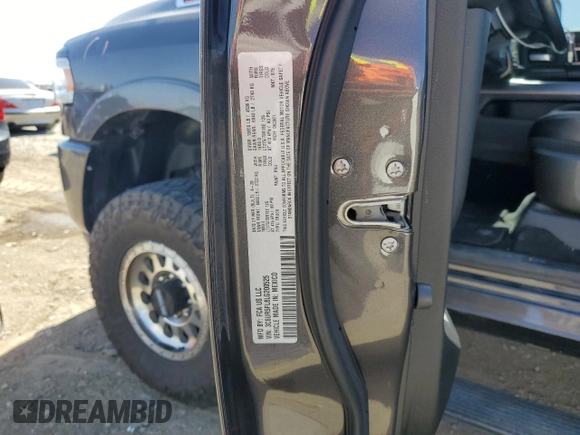 2020 Ram 2500 Laramie with VIN 3C6UR5FL8LG200525, listed as a Copart auction lot 56985625 with 59,151 mi miles and Salvage title. Bid and sale history available at DreamBid. Image 12.