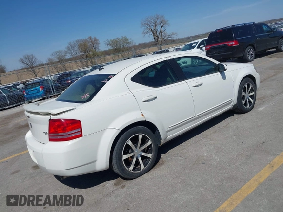 2008 Dodge Avenger R/T with VIN 1B3LC76MX8N638585, listed as a IAAI auction lot 42032788 with 291,365 mi miles and . Bid and sale history available at carsss.com. Image 4.