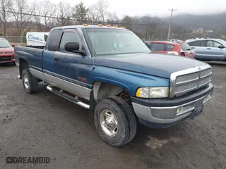2002 Dodge Ram 2500 with VIN 3B7KF236X2M293084, listed as a IAAI auction lot 41876449 with 164,418 mi miles. Bid and sale history available at carsss.com. Image 1.
