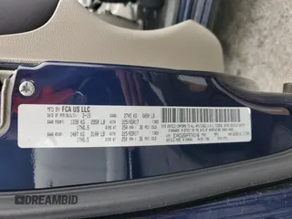 2015 Dodge Grand Caravan SE with VIN 2C4RDGBG0FR702106, listed as a Copart auction lot 54595205 with 209,319 mi miles and Salvage Title. Bid and sale history available at DreamBid. Image 13.