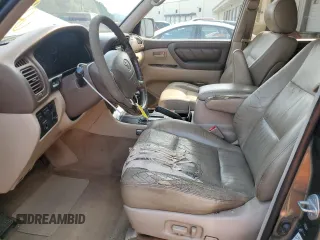 1999 Toyota Land Cruiser z VIN JT3HT05J8X0047612, wystawiony jako Copart lot #60983565 z przebiegiem 390 718 mil mil oraz Czysty tytuł • Clean title. Historia ofert i sprzedaży dostępna na DreamBid. Obrazek 7.