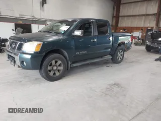 2005 Nissan Titan LE with VIN 1N6AA07B55N500154, listed as a IAAI auction lot 42455068 with 147,180 mi miles and . Bid and sale history available at DreamBid. Image 2.