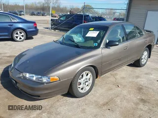 2000 Oldsmobile Intrigue GX z VIN 1G3WH52H0YF280823, wystawiony jako IAAI lot #42199925 z przebiegiem 102 427 mil mil oraz . Historia ofert i sprzedaży dostępna na DreamBid. Obrazek 2.