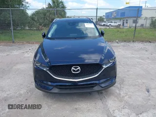 2017 Mazda CX-5 Touring with VIN JM3KFACL0H0227615, listed as a IAAI auction lot 42063618 with 72,291 mi miles. Bid and sale history available at carsss.com. Image 12.