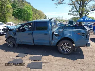 2023 Ford F-150 XL with VIN 1FTFW1E53PKD99214, listed as a IAAI auction lot 42211755 with 31 mi miles and . Bid and sale history available at DreamBid. Image 14.