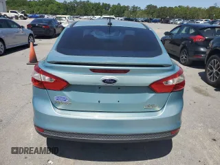 2012 Ford Focus SE with VIN 1FAHP3F29CL428201, listed as a Copart auction lot 52566905 with 209,909 mi miles and Salvage title. Bid and sale history available at DreamBid. Image 6.