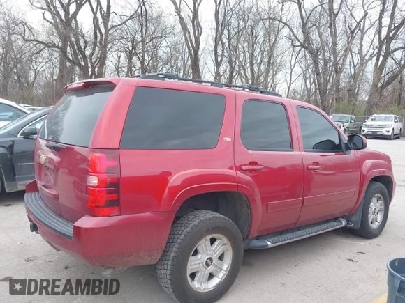 2013 Chevrolet Tahoe LT with VIN 1GNSKBE01DR270967, listed as a IAAI auction lot 41875788 with 200,687 mi miles and . Bid and sale history available at DreamBid. Image 13.