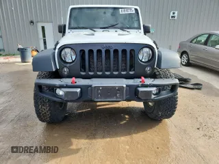 2015 Jeep Wrangler Unlimited Rubicon with VIN 1C4BJWFGXFL518301, listed as a Copart auction lot 61910775 with 153,945 mi miles and Clean title. Bid and sale history available at DreamBid. Image 5.