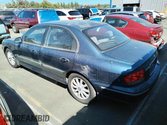 2002 Hyundai Sonata GLS with VIN KMHWF35H12A702457, listed as a Copart auction lot 60985574 with 99,698 mi miles and Salvage Title. Bid and sale history available at carsss.com. Image 2.