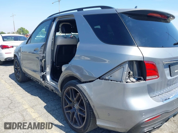 2016 Mercedes-Benz GLE 63 S AMG with VIN 4JGDA7FB6GA631271, listed as a IAAI auction lot 42470832 with 120,972 mi miles and . Bid and sale history available at DreamBid. Image 18.
