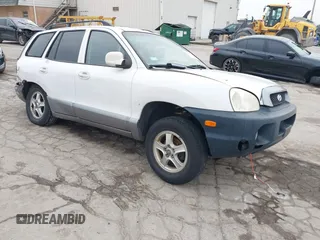 2002 Hyundai Santa Fe GLS z VIN KM8SC13D52U161083, wystawiony jako IAAI lot #41151063 z przebiegiem 261 804 mil mil oraz . Historia ofert i sprzedaży dostępna na DreamBid. Obrazek 1.