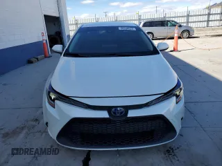 2021 Toyota Corolla Hybrid LE with VIN JTDEAMDE2MJ030570, listed as a Copart auction lot 50530625 with 80,249 mi miles and Salvage Title. Bid and sale history available at carsss.com. Image 5.