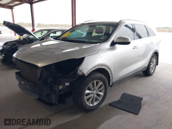 2018 Kia Sorento LX with VIN 5XYPG4A55JG360565, listed as a IAAI auction lot 41031059 with 138,963 mi miles and . Bid and sale history available at DreamBid. Image 17.