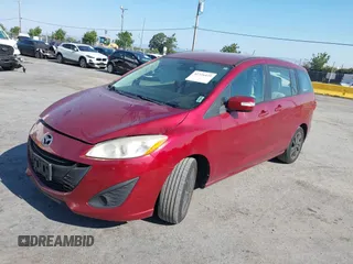 2014 Mazda 5 Sport with VIN JM1CW2BL9E0168662, listed as a IAAI auction lot 42726429 with 145,190 mi miles and . Bid and sale history available at DreamBid. Image 17.