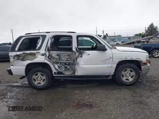 2004 Chevrolet Tahoe LS with VIN 1GNEC13Z94R265831, listed as a IAAI auction lot 41840133 with 176,219 mi miles and . Bid and sale history available at DreamBid. Image 14.