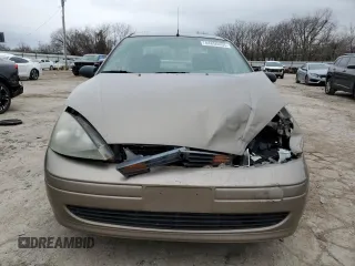 2003 Ford Focus LX with VIN 1FAFP33P73W114861, listed as a Copart auction lot 44859405 with 100,574 mi miles and Salvage Title. Bid and sale history available at carsss.com. Image 5.