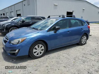 2016 Subaru Impreza 2.0i with VIN JF1GPAA64G8319602, listed as a Copart auction lot 62409515 with 127,297 mi miles and Clean title. Bid and sale history available at DreamBid. Image 1.