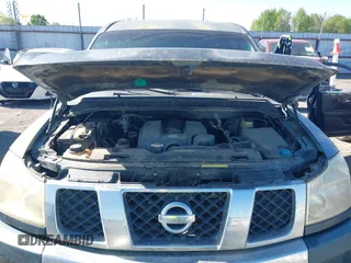 2004 Nissan Titan LE with VIN 1N6AA07B74N547779, listed as a IAAI auction lot 41977881 with 157,348 mi miles and . Bid and sale history available at carsss.com. Image 10.