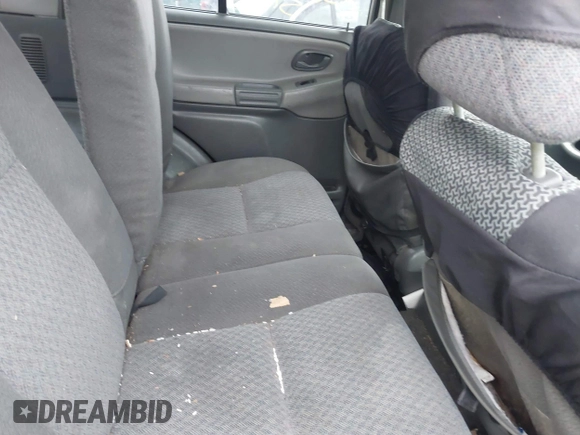 2003 Chevrolet Tracker with VIN 2CNBJ13C236947064, listed as a IAAI auction lot 41820066 with Not provided miles and . Bid and sale history available at DreamBid. Image 8.