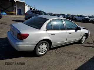 2001 Saturn SL z VIN 1G8ZH52891Z317279, wystawiony jako Copart lot #55163885 z przebiegiem 136 029 mil mil oraz Nie do naprawy • Non repairable. Historia ofert i sprzedaży dostępna na DreamBid. Obrazek 3.