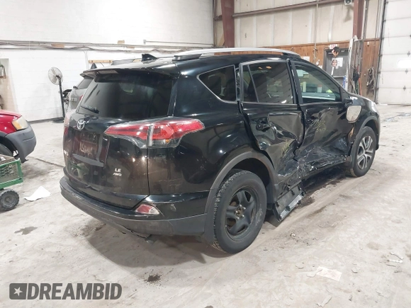 2017 Toyota RAV4 LE with VIN 2T3BFREV8HW571887, listed as a IAAI auction lot 41612815 with 100,742 mi miles and . Bid and sale history available at DreamBid. Image 4.