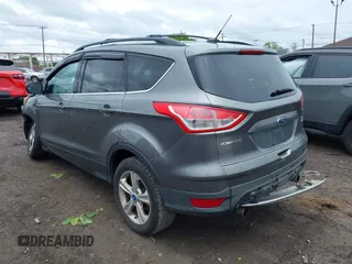 2013 Ford Escape SE with VIN 1FMCU9GX9DUA57901, listed as a IAAI auction lot 42367615 with 140,000 mi miles and . Bid and sale history available at DreamBid. Image 3.