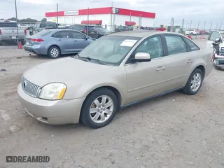 2005 Mercury Montego with VIN 1MEHM40195G606109, listed as a IAAI auction lot 40739316 with 329,715 mi miles. Bid and sale history available at carsss.com. Image 2.