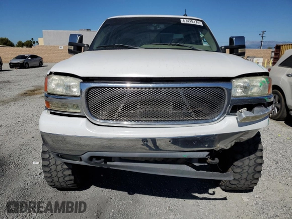 2002 GMC Sierra 1500HD SLE z VIN 1GTGK13U22F213058, wystawiony jako Copart lot #67418174 z przebiegiem 178 940 mil mil oraz Szkody całkowita. Historia ofert i sprzedaży dostępna na DreamBid. Obrazek 5.