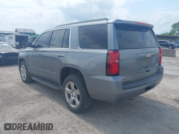 2019 Chevrolet Tahoe LT z VIN 1GNSCBKC8KR406519, wystawiony jako IAAI lot #42145021 z przebiegiem 74 694 mil mil oraz . Historia ofert i sprzedaży dostępna na DreamBid. Obrazek 3.