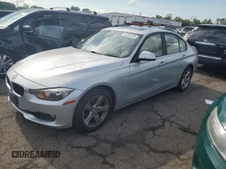 2013 BMW 3 Series 328i xDrive with VIN WBA3B5C54DJ598845, listed as a Copart auction lot 62359705 with 116,699 mi miles and Salvage title. Bid and sale history available at DreamBid. Image 1.